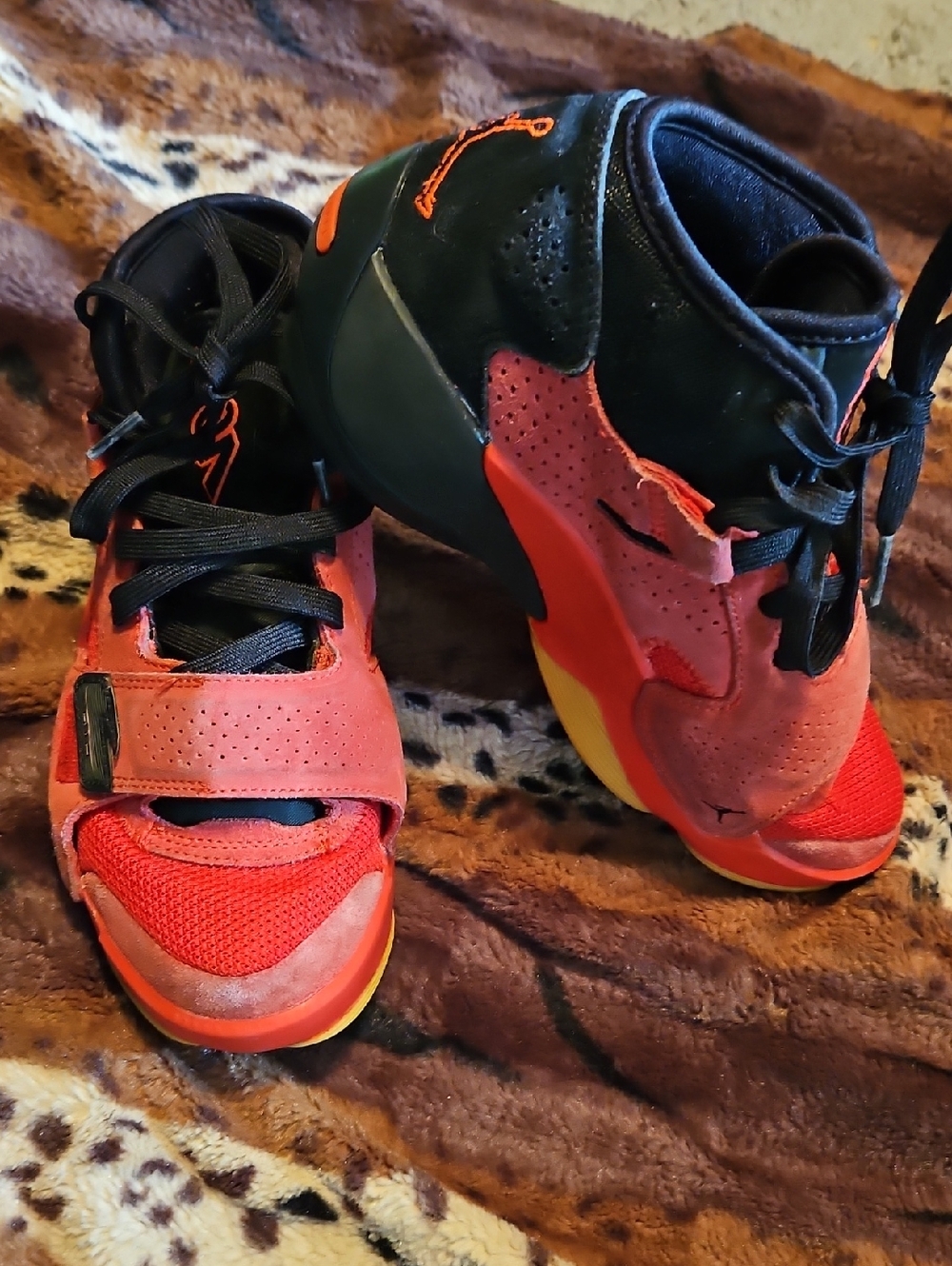 Nike Air Jordans Kids Red and Black High-Top Sneakers with Orange Accents